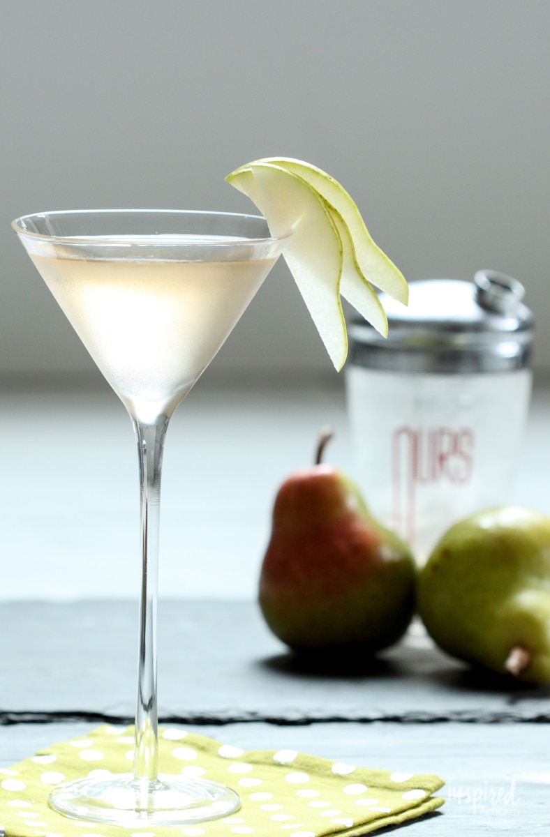 pear martini in glass with shaker
