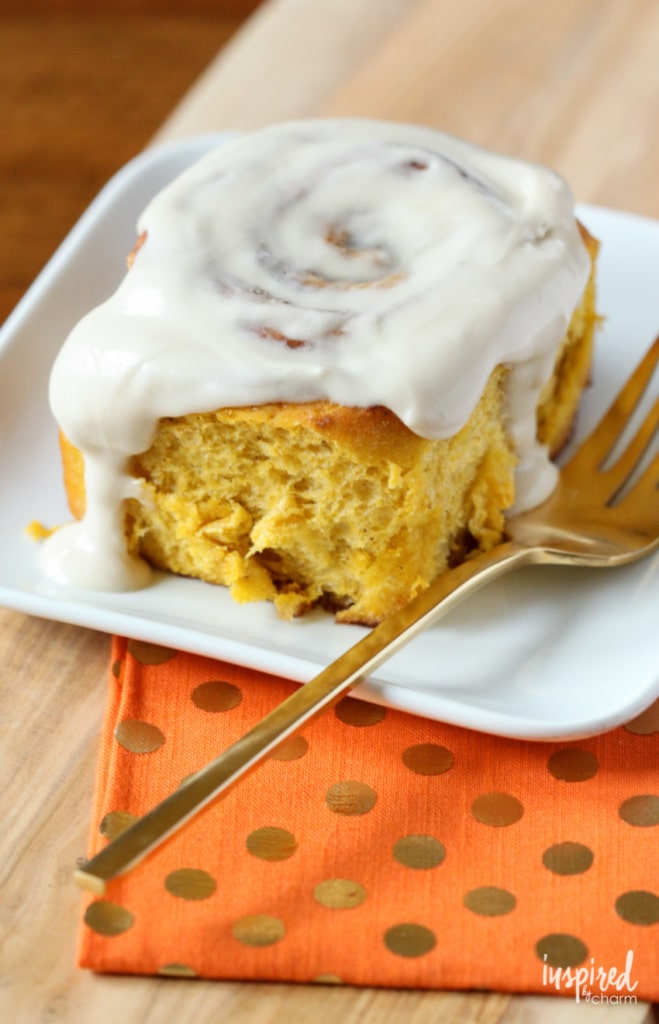 Delicious Homemade Pumpkin Cinnamon Rolls with Maple Cream Cheese Frosting #fall #baking #autumn #pumpkin #pumpkinspice #cinnamonrolls #recipe #breakfast #dessert