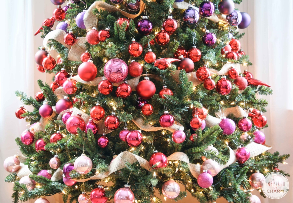 new and vintage ornaments on a green tree