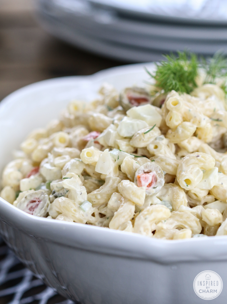 close up of pasta salad with boiled eggs and olive