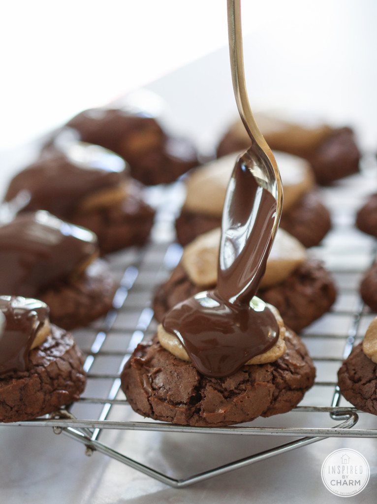 drizzling chocolate on top of buckeye cookies