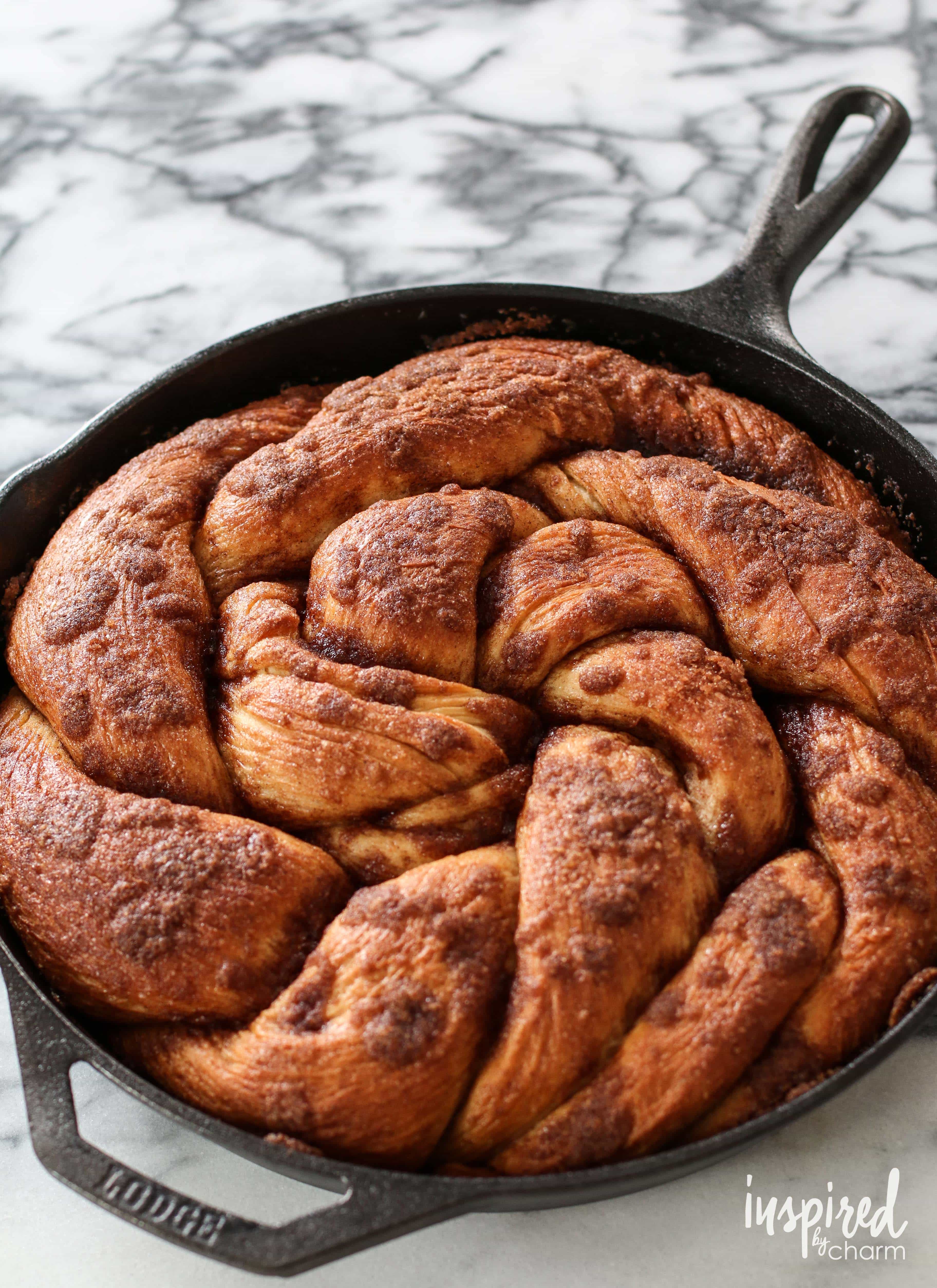 Cinnamon Roll Skillet Bread with streusel topping in cast iron pan.