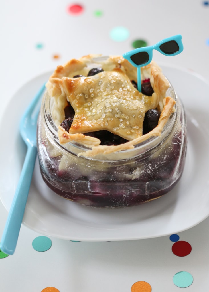Mason Jar Blueberry Pies on a plate.