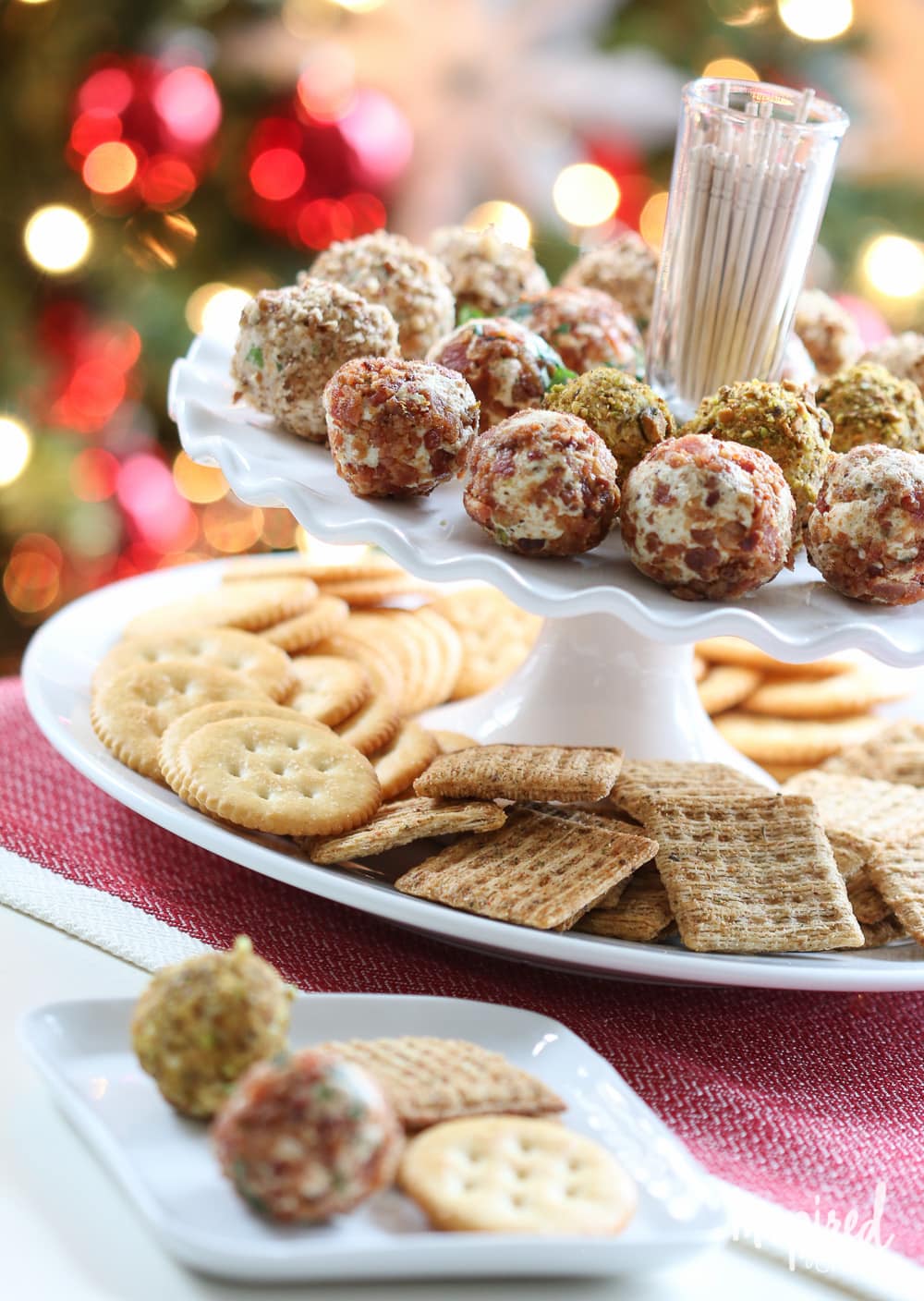 mini cheese balls on a plate with a festive background. 