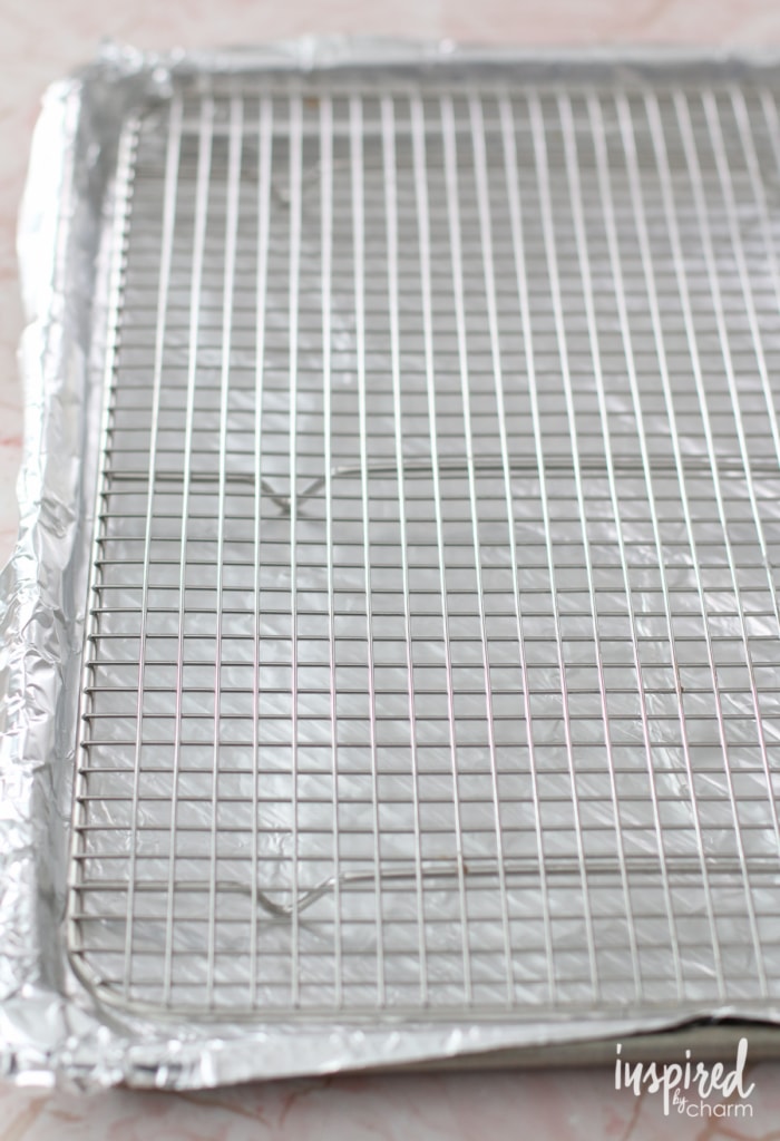 baking sheet lined with aluminum foil and cooling rack 