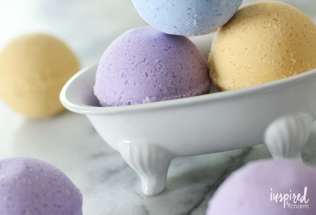 blue, purple and yellow DIY bath bombs in a bowl