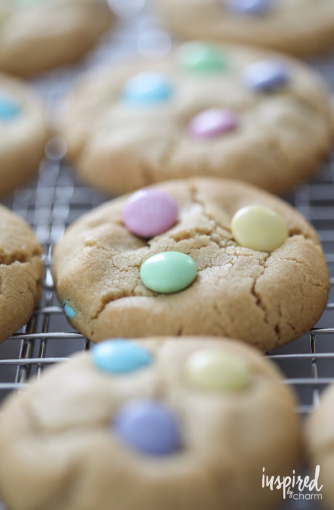Soft Peanut Butter Cookies with M&Ms on a cooling rack.
