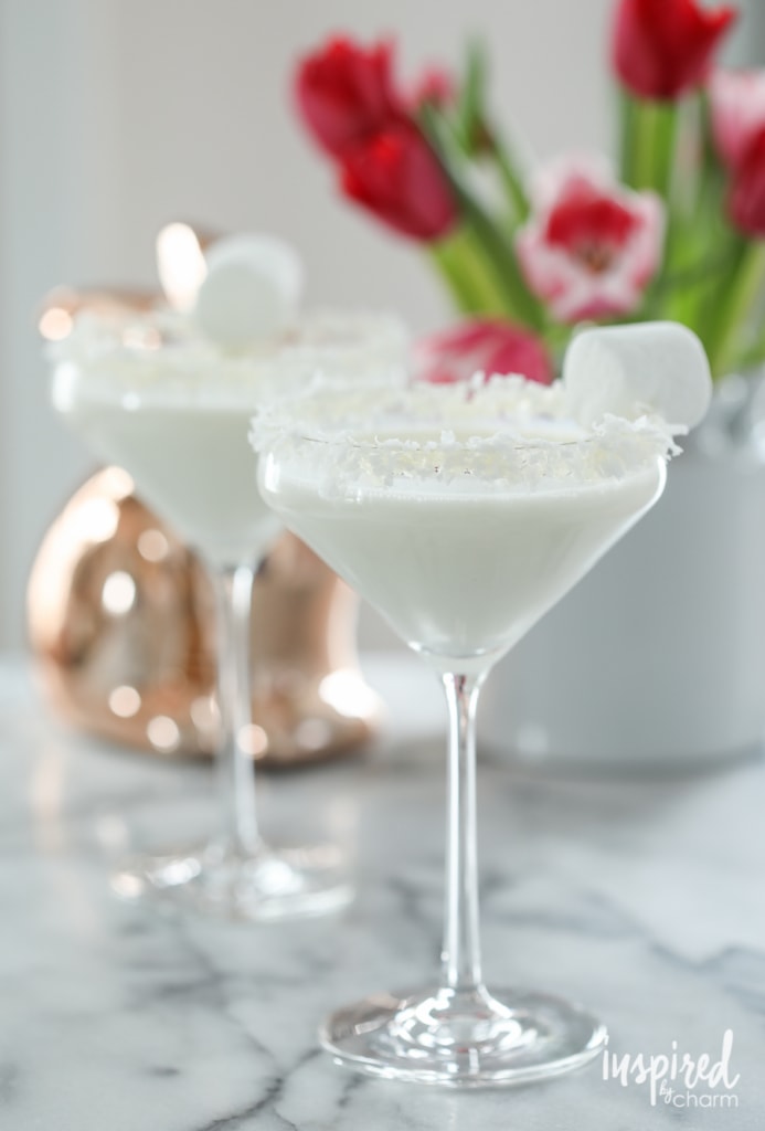 coconut martini - glass rimmed with shredded coconut and a marshmallow