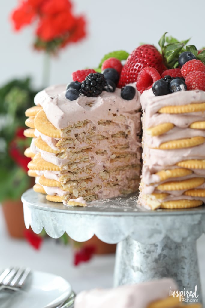This Ritz Cracker and Mixed Berry Icebox Cake is the perfect dessert for summer entertaining. | Inspired by Charm
