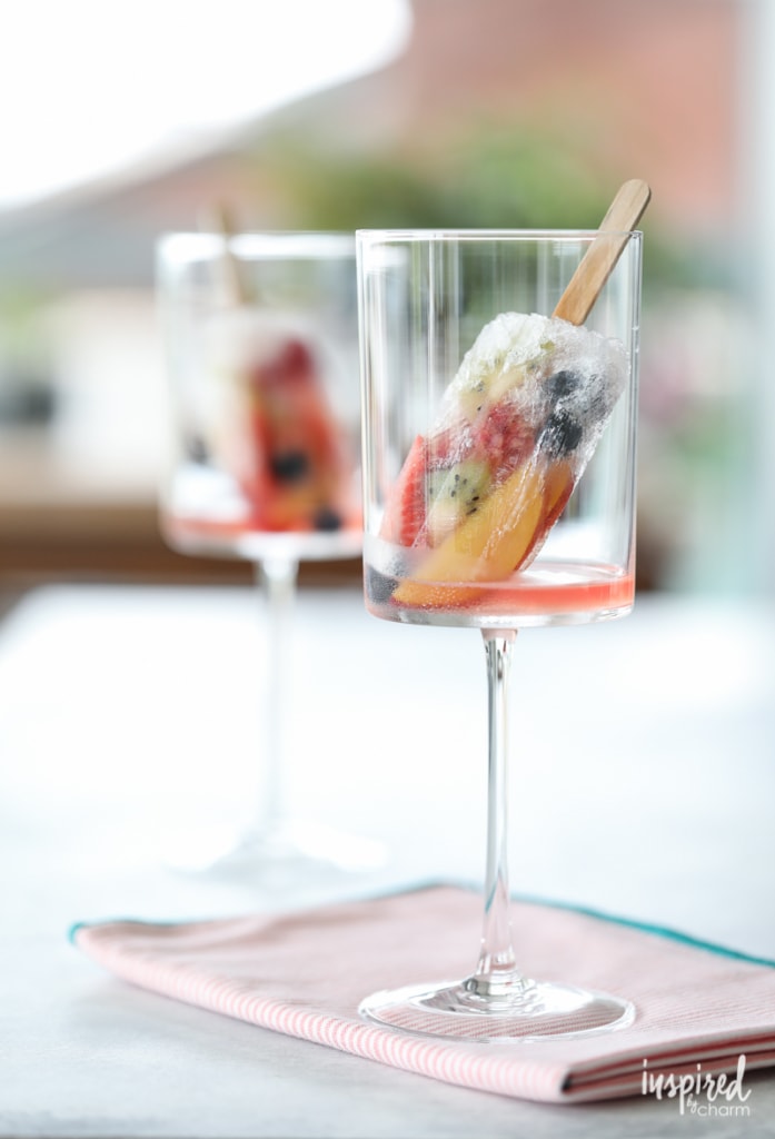 Sangria Rose Popsicles are the perfect boozy summer dessert treat. | Inspired by Charm