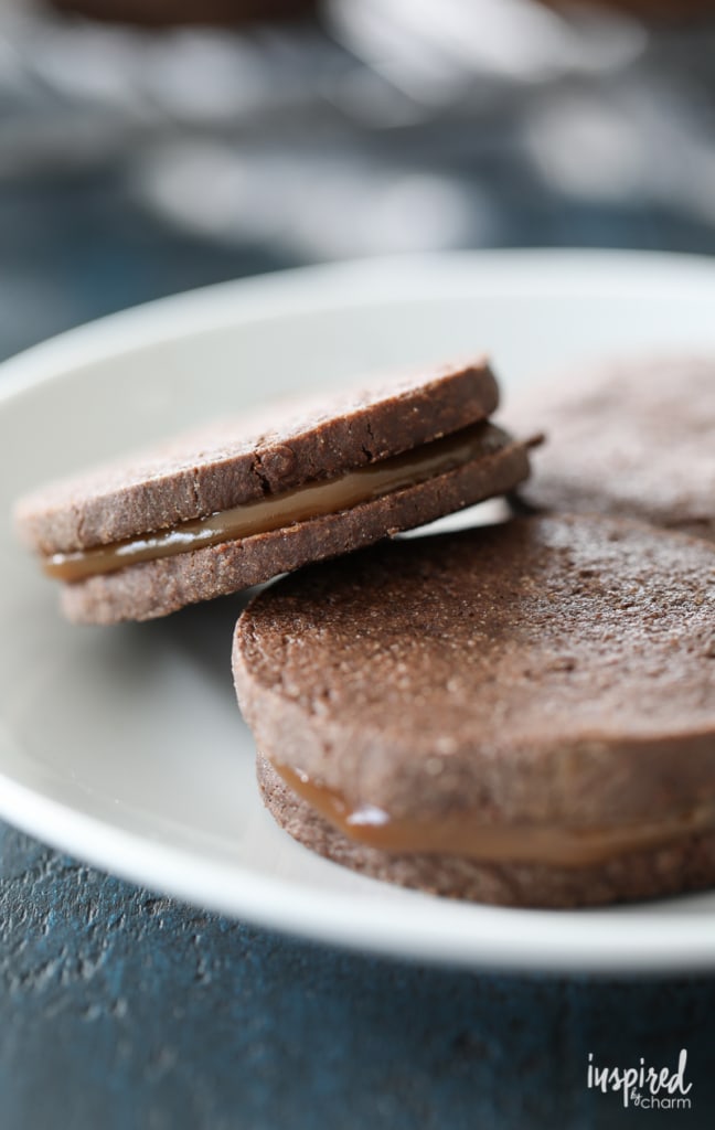 Dulce de Leche Chocolate Sandwich Cookies combine spiced chocolate cookies and rich dulce de leche for a delicious fall dessert. 