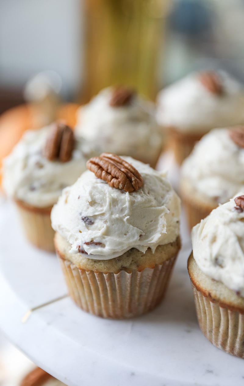 These Butter Pecan Cupcakes are loaded with toasted pecans making them the perfect fall treat. #butterpecan #cupcake #recipe #pecan #cupcakes #dessert #cake