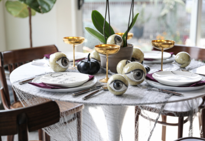 Wicked and Eclectic Halloween Table Setting - spooky chic tablescape decor ideas