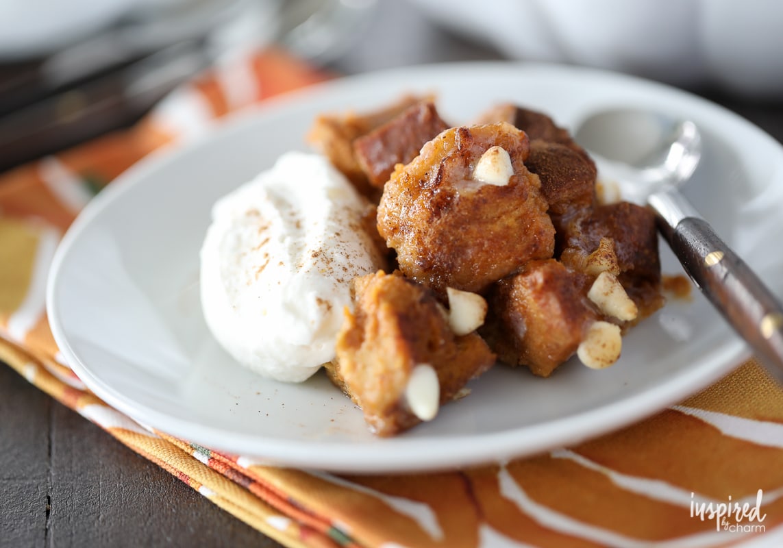 This Pumpkin White Chocolate Bread Pudding made with challah bread and pumpkin custard is the perfect dessert for fall.