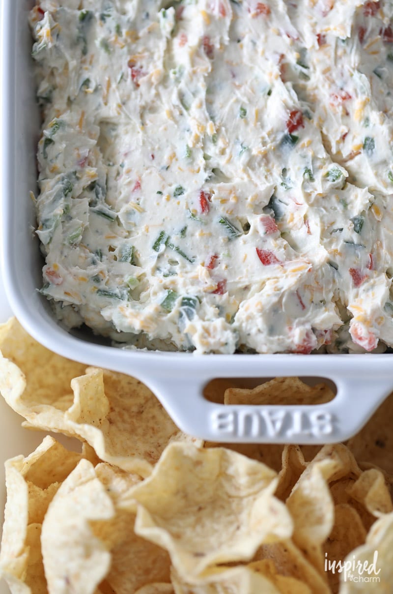 The BEST jalapeño dip in a pan with tortilla chips