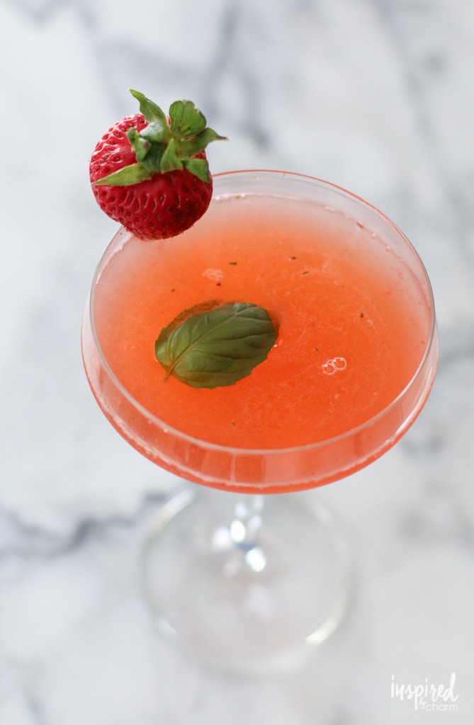 This Strawberry Basil Martini is like sipping on summer! #cocktail #strawberry #martini #basil #recipe