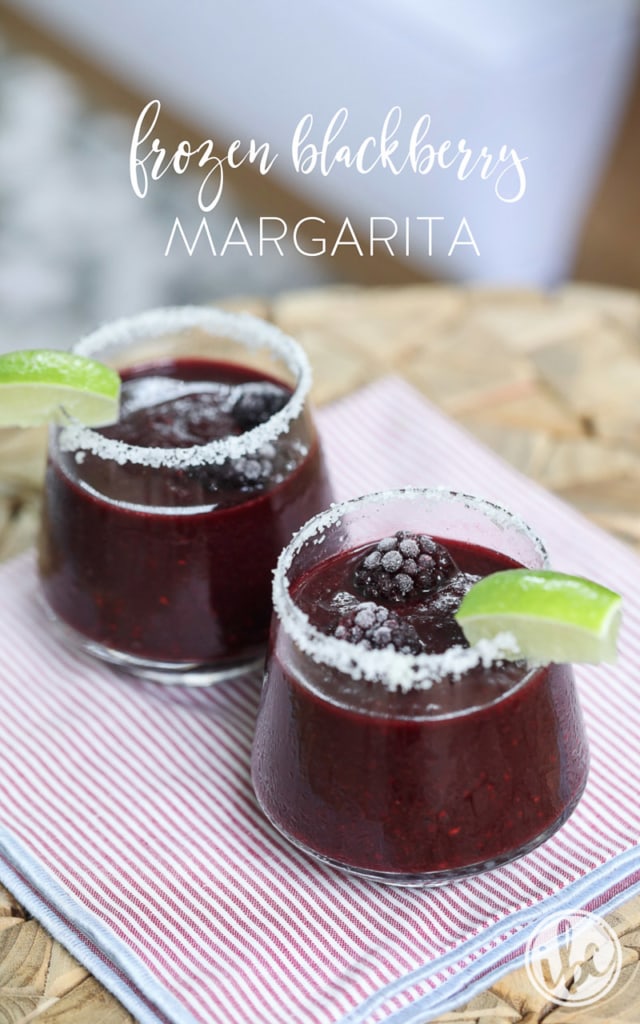 2 blackberry margaritas rimmed with salt and lime