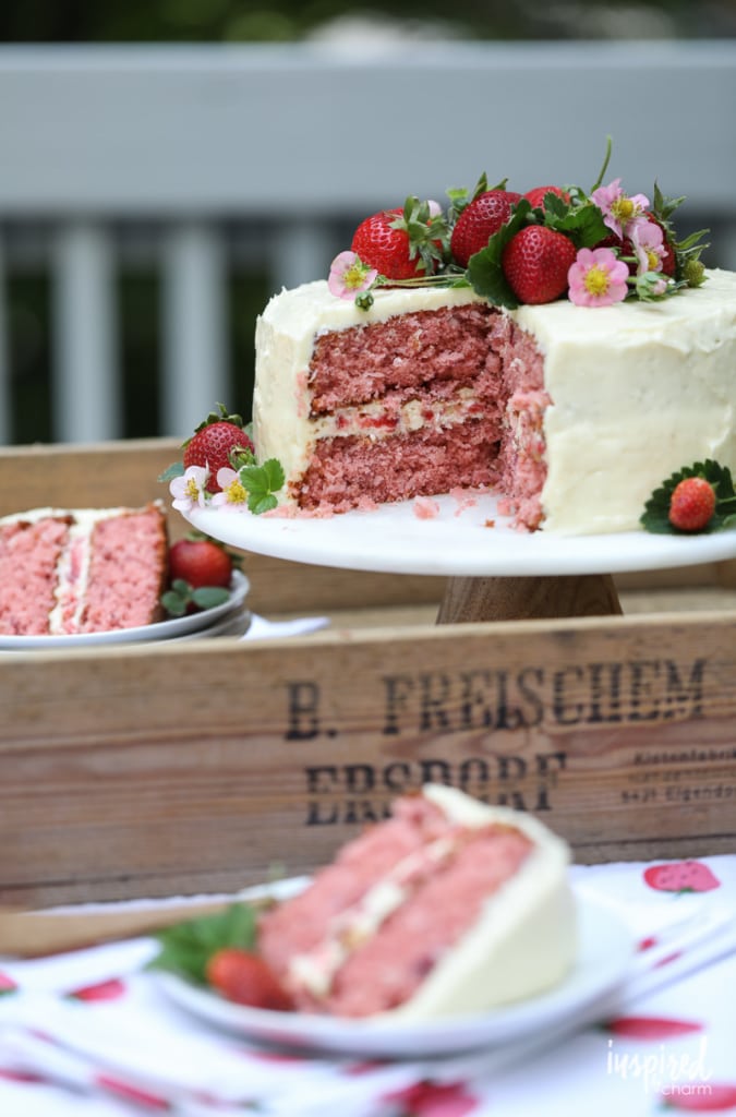 Strawberry Coconut Cake on cake stand.