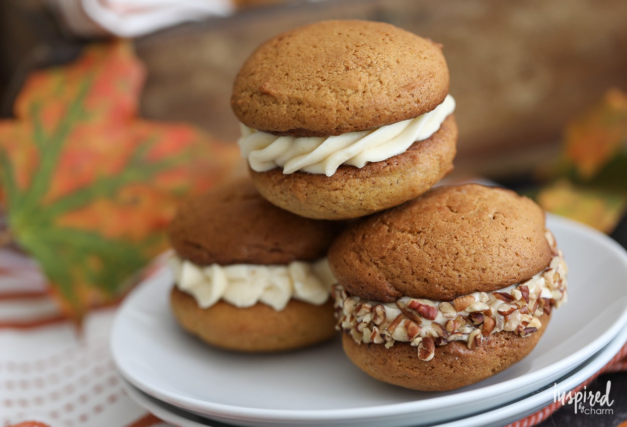 I love these Pumpkin Whoopie Pies with Salted Caramel Cream Cheese Frosting for a delicious fall dessert recipe. #pumpkin #pumpkinspice #fall #baking #dessert #whoopiepie