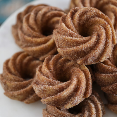 These Baked Apple Cider Donuts are a delicious fall treat! #donut #applecider #fallbaking #recipe #apple #bakeddonut