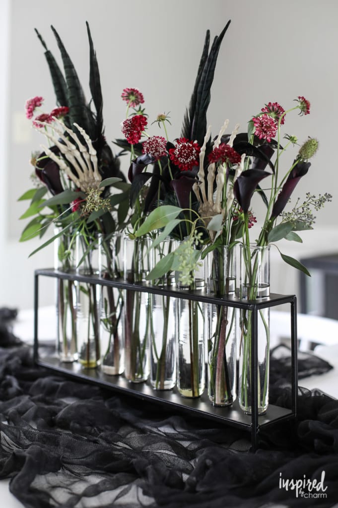 skeleton hands as part of a floral arrangement centerpiece