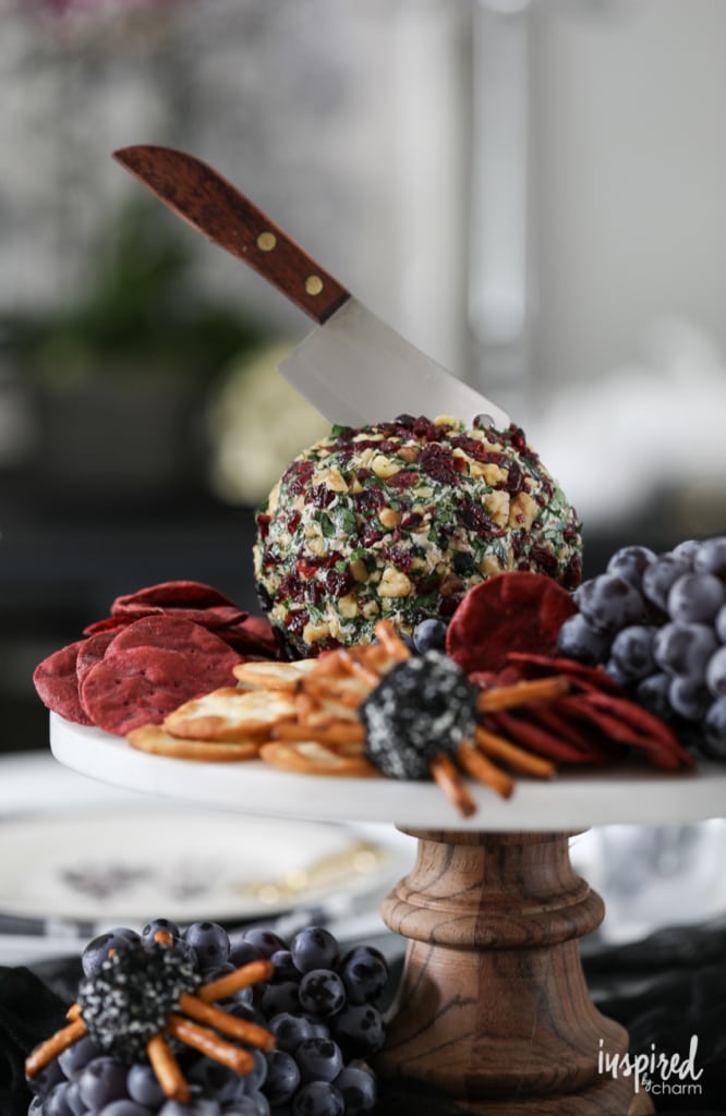 Try this Cranberry Bacon & Walnut Cheeseball for a delicious and easy Halloween appetizer recipe. #halloween #cheeseball #cranberry #bacon #appetizer #recipe