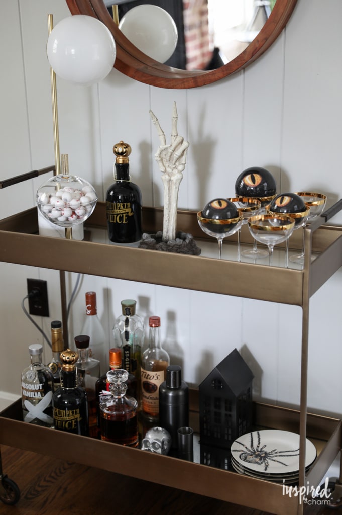 Halloween Bar Cart and Mantel Decor Ideas to Die for #halloween #decor #decorations #spooky #skeleton #mantel 