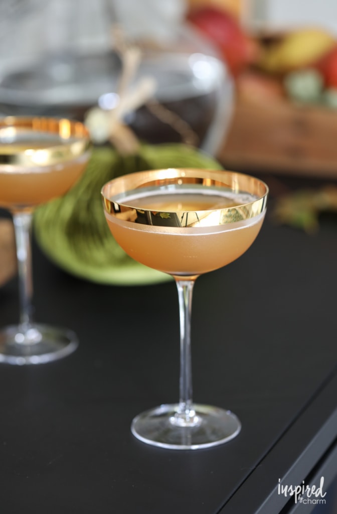 Apple Cider Sidecar in gold rimmed coupe glass.