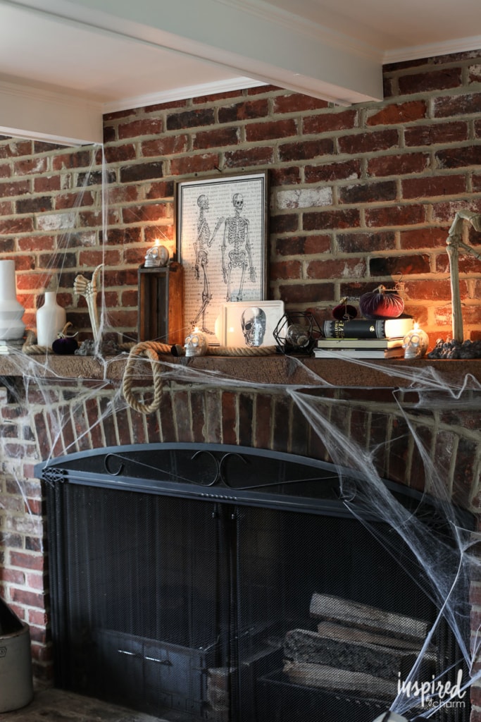 Bone-Chilling Halloween Mantel Decor Ideas #halloween #decor #decorations #spooky #skeleton #mantel 