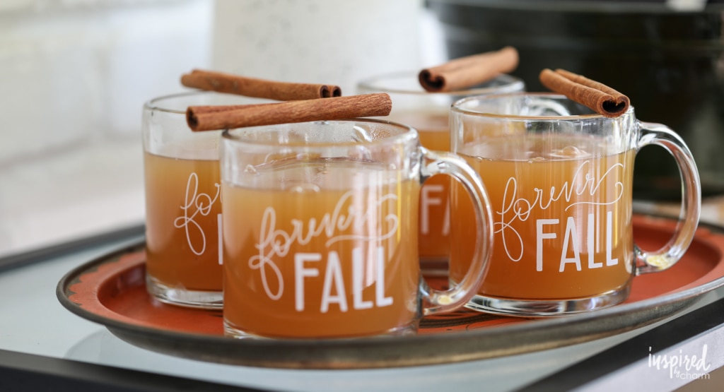 mulled cider in mugs that say forever fall