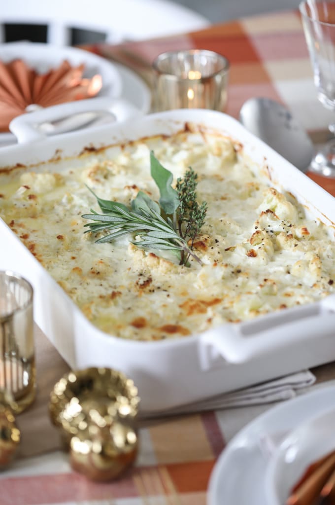 This Cheesy Cauliflower Gratin makes the most delicious holiday side dish. #cauliflower #vegetable #sidedish #recipe #thanksgiving #christmas