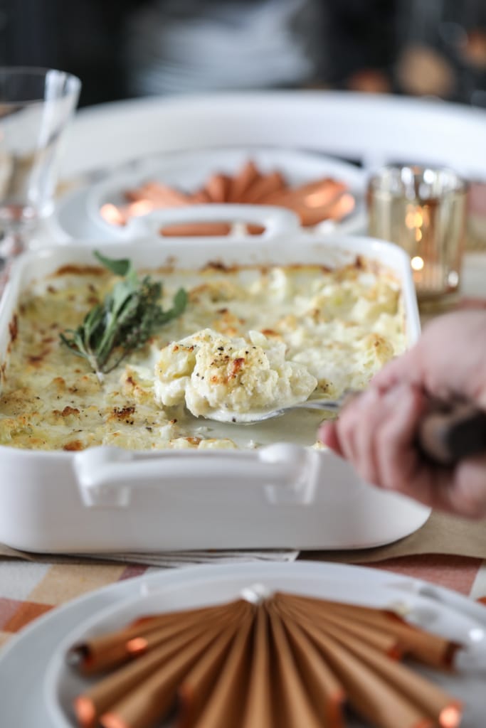 This Cheesy Cauliflower Gratin makes the most delicious holiday side dish. #cauliflower #vegetable #sidedish #recipe #thanksgiving #christmas