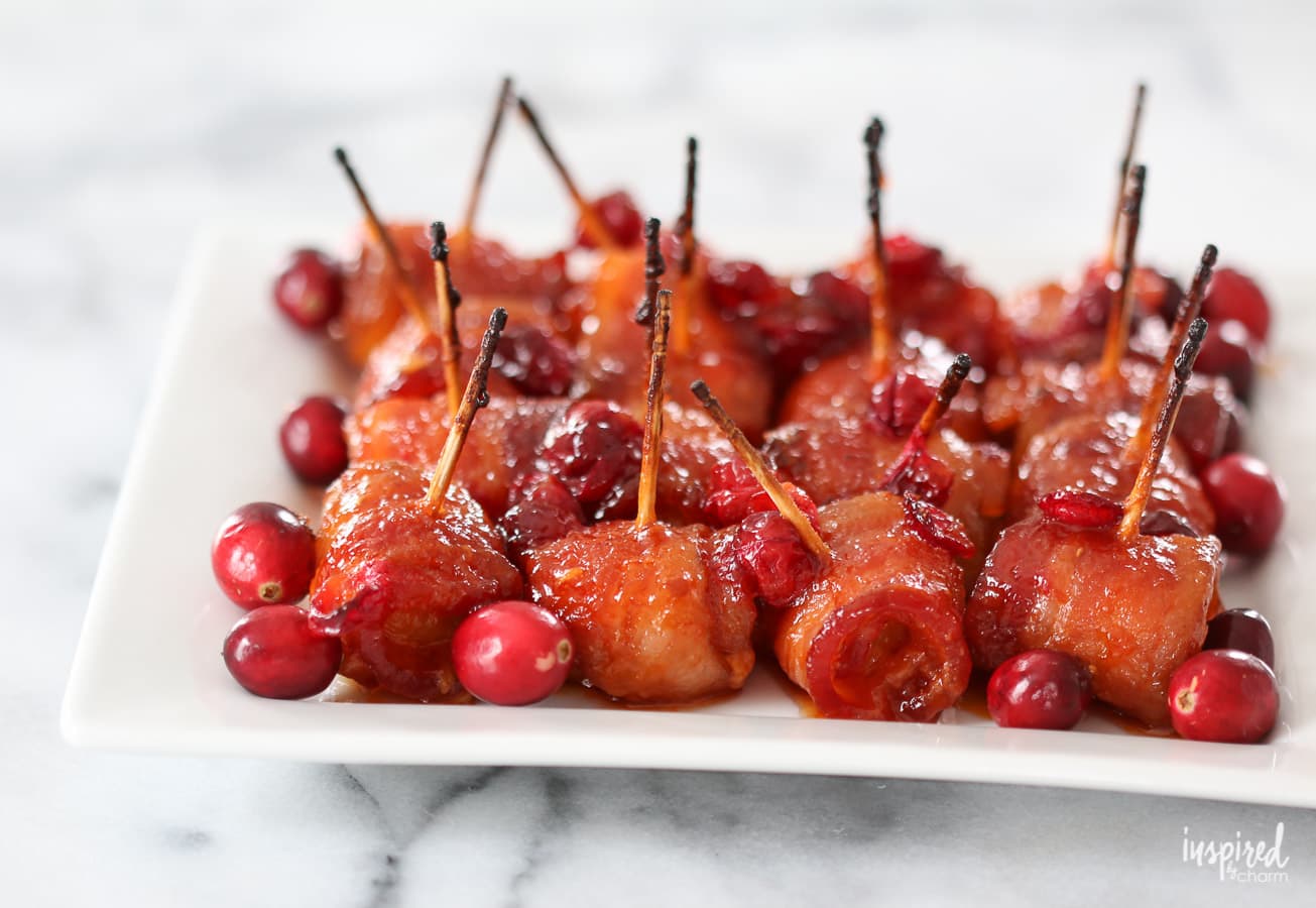 These Cranberry Bacon Wrapped Water Chestnuts make the perfect Christmas appetizer recipe. #appetizer #bacon #waterchestnuts #holiday #christmas #recipe