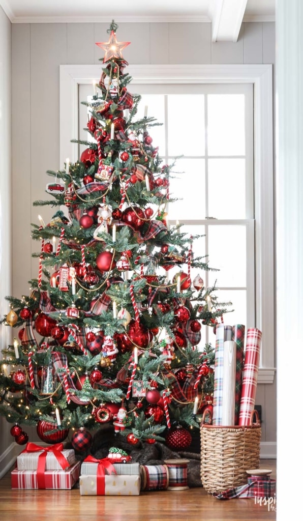 Christmas tree decorated with classic nostalgic red and white ornaments and trimming