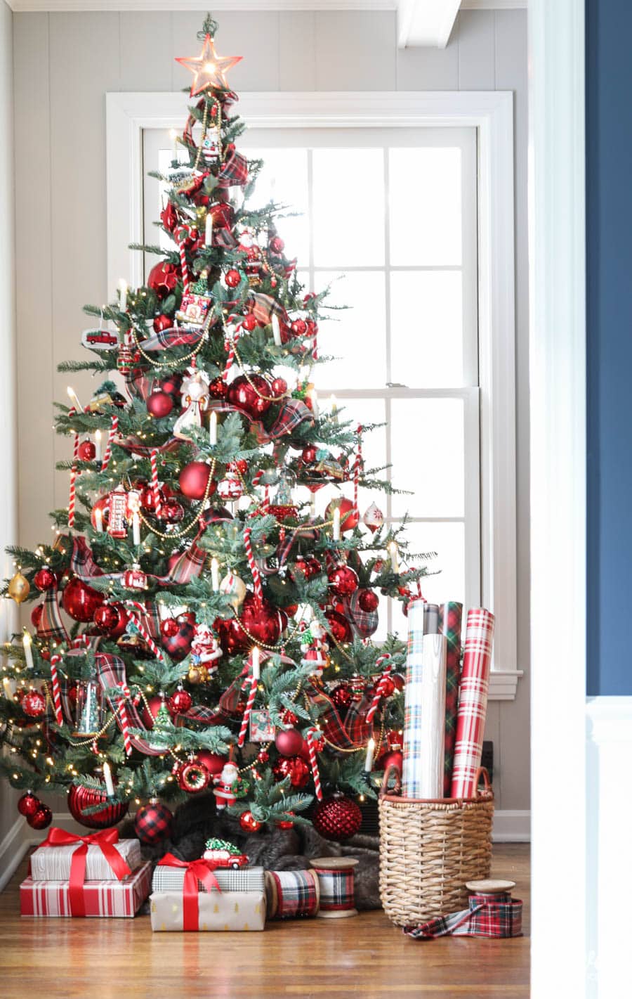 nostalgic Christmas tree themes using candy canes, Santa ornaments, and other classic elements