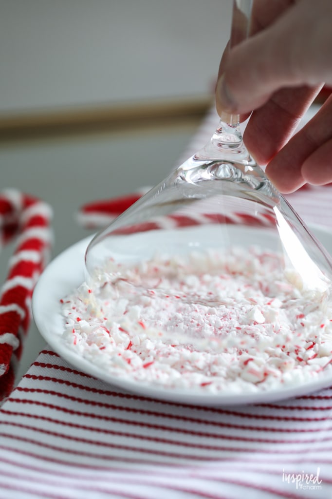 dipping martini glass into crushed peppermint