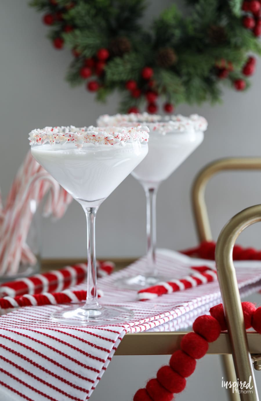 white chocolate martini in glass with crushed peppermint rim. 