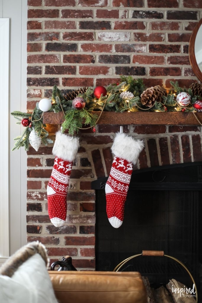 Red and Rustic Christmas Mantel Styling Inspiration #christmas #decorations #holiday #mantel #manteldecor 
