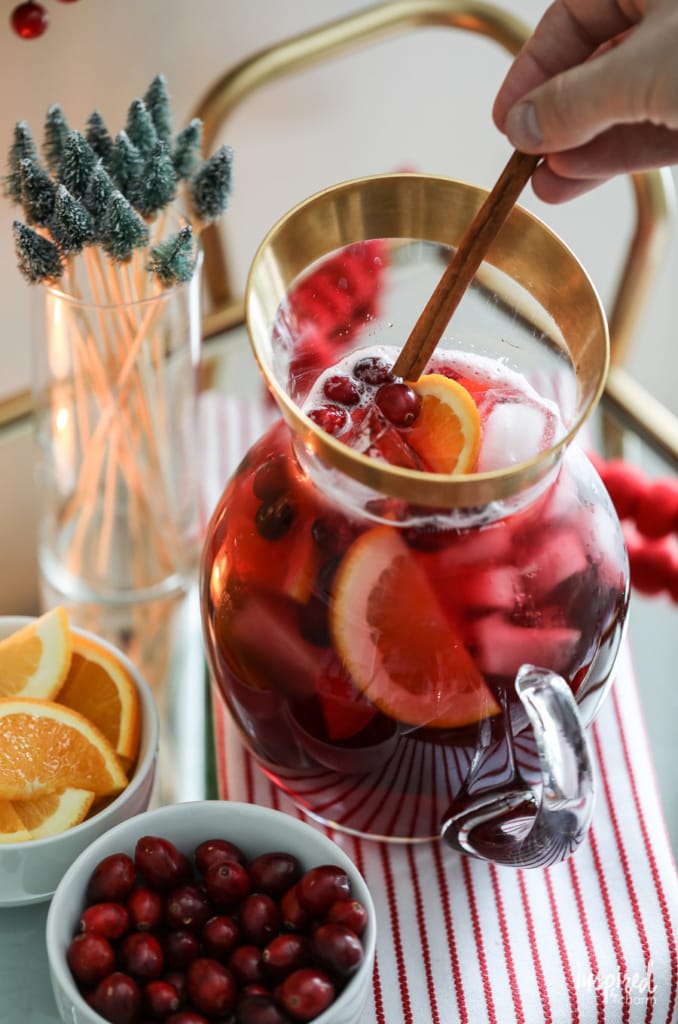 A delicious and easy Non-Alcoholic Sangria for Christmas #christmas #holiday #sangria #mocktail #recipe #drink