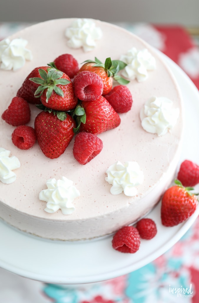 This Strawberry Ice Cream Cheesecake is a delicious summer dessert recipe. #summer #strawberry #cake #cheesecake #icecream #recipe #dessert