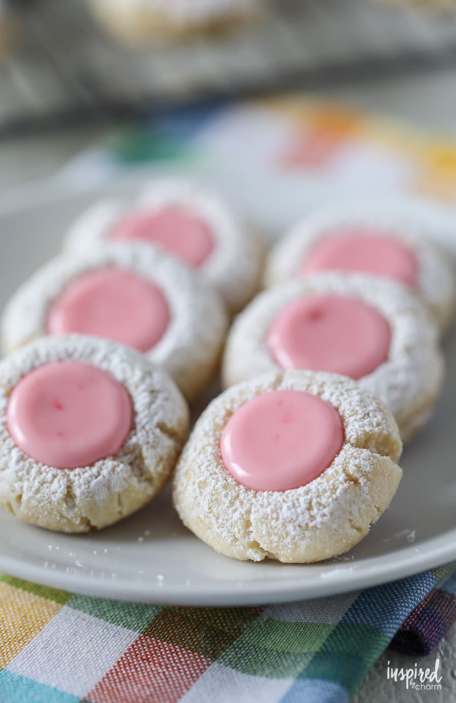 close up of pink Lemonade Thumbprint Cookies on a small plate.