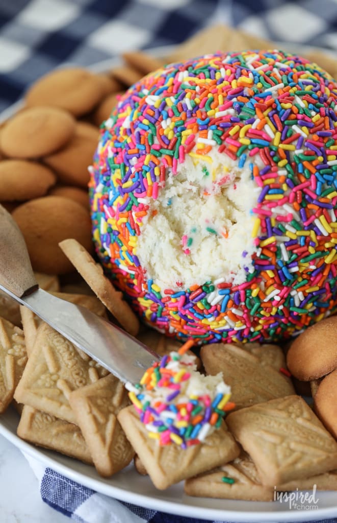 Funfetti cheeseball with colorful sprinkles and cookies for dipping.