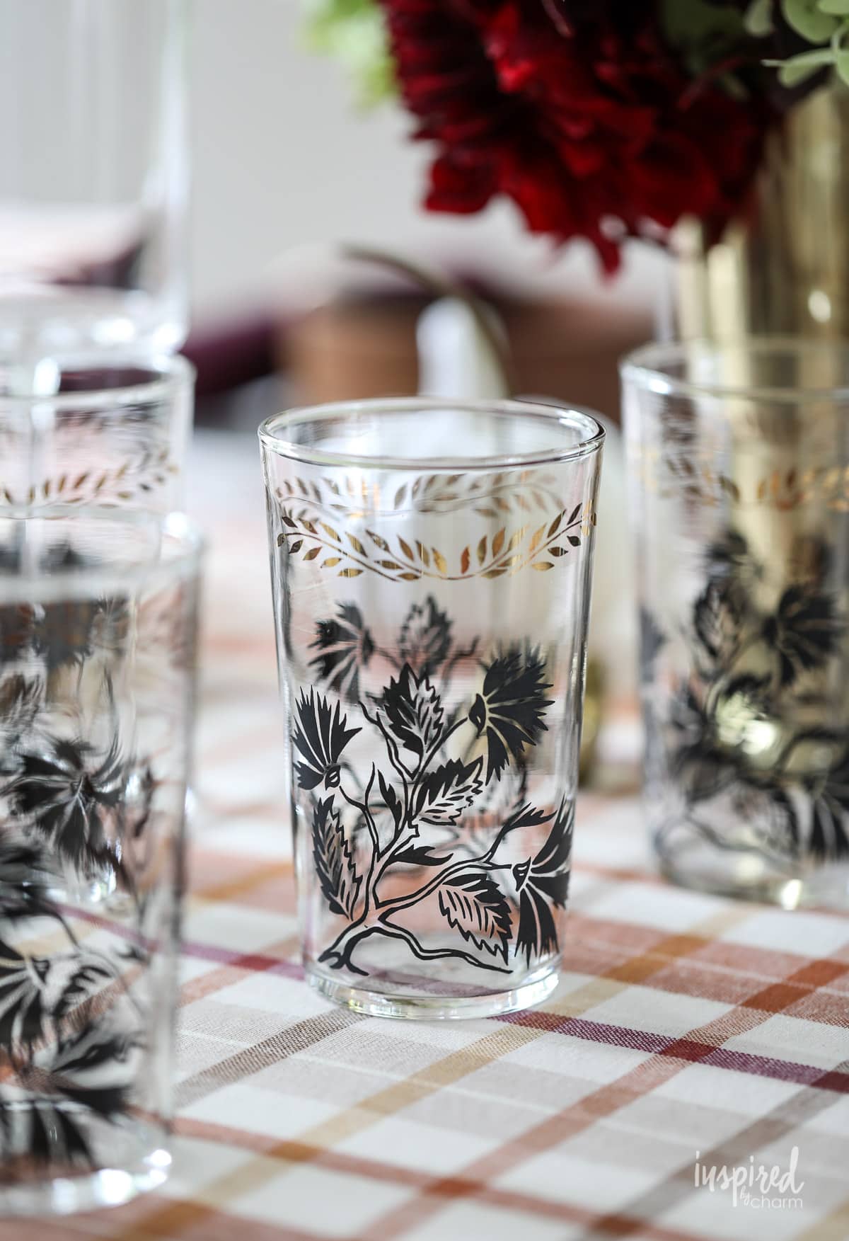 close up of vintage glassware cup with floral design.