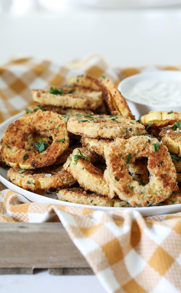 These Baked Delicata Rings with Creamy Herb Dip are delicious and unique fall appetizer recipe. #crispy #baked #delicata #rings #fall #appetizer #recipe