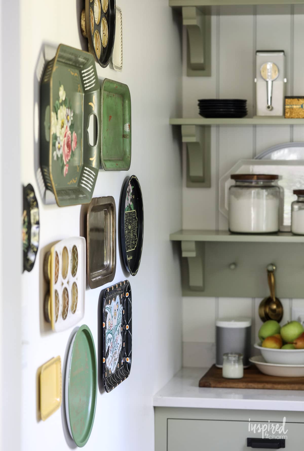 Vintage Metal Tray Gallery Wall in a kitchen.
