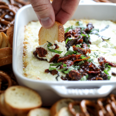 Delicious Baked Goat Cheese Dip with Sun-Dried Tomatoes #dip #recipe #baked #goatcheese #sundriedtomatoes #appetizer