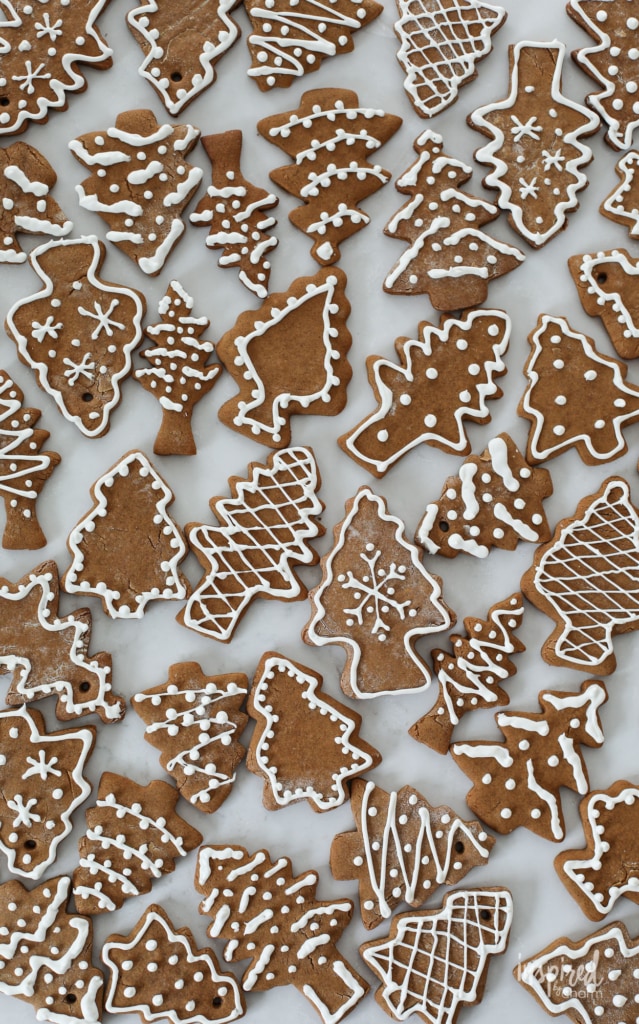 classic gingerbread cookies iced on a countertop