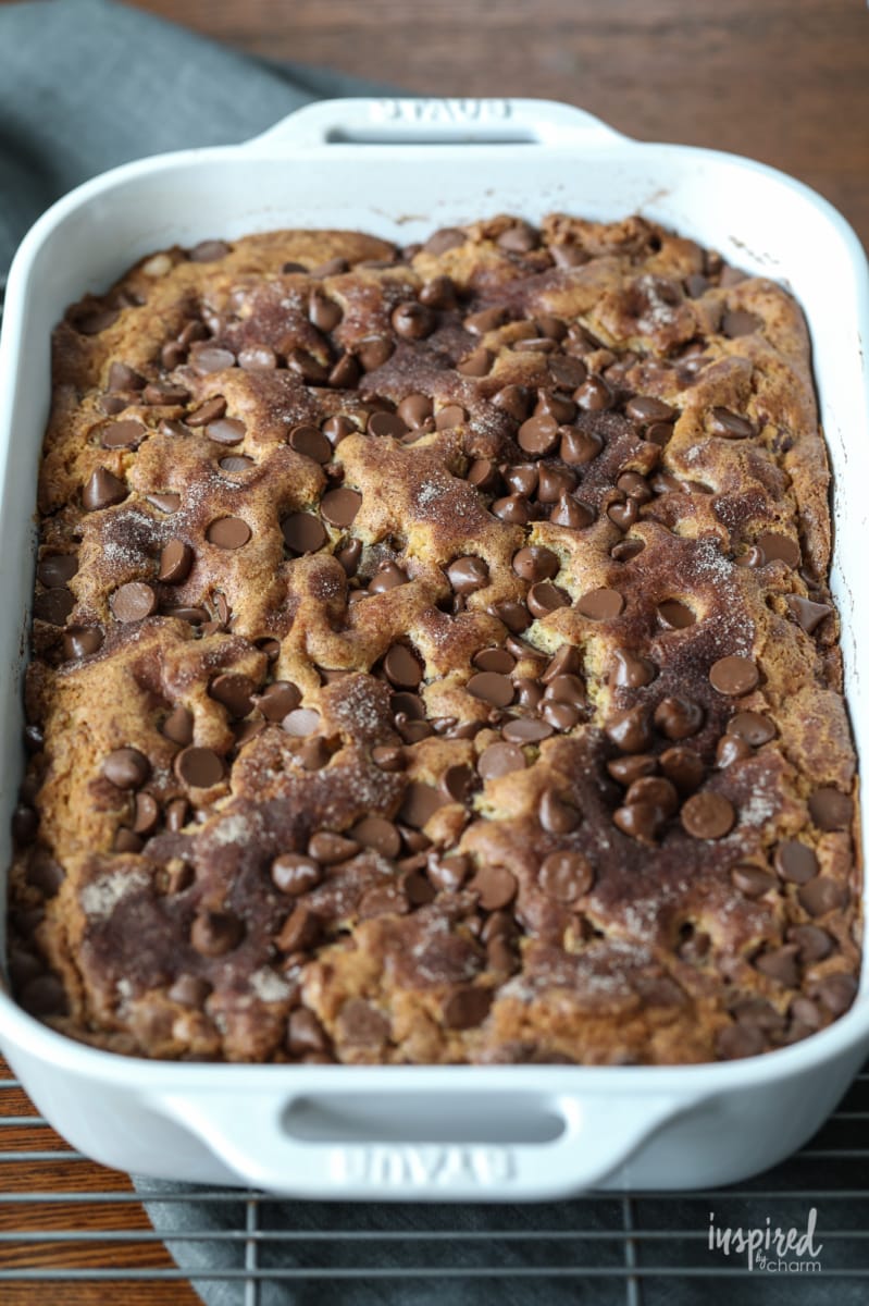 chocolate chip cake baked in a white baking dish.