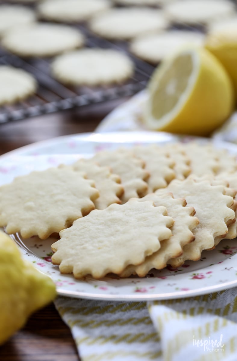 thin lemon flavored cookies on a plate