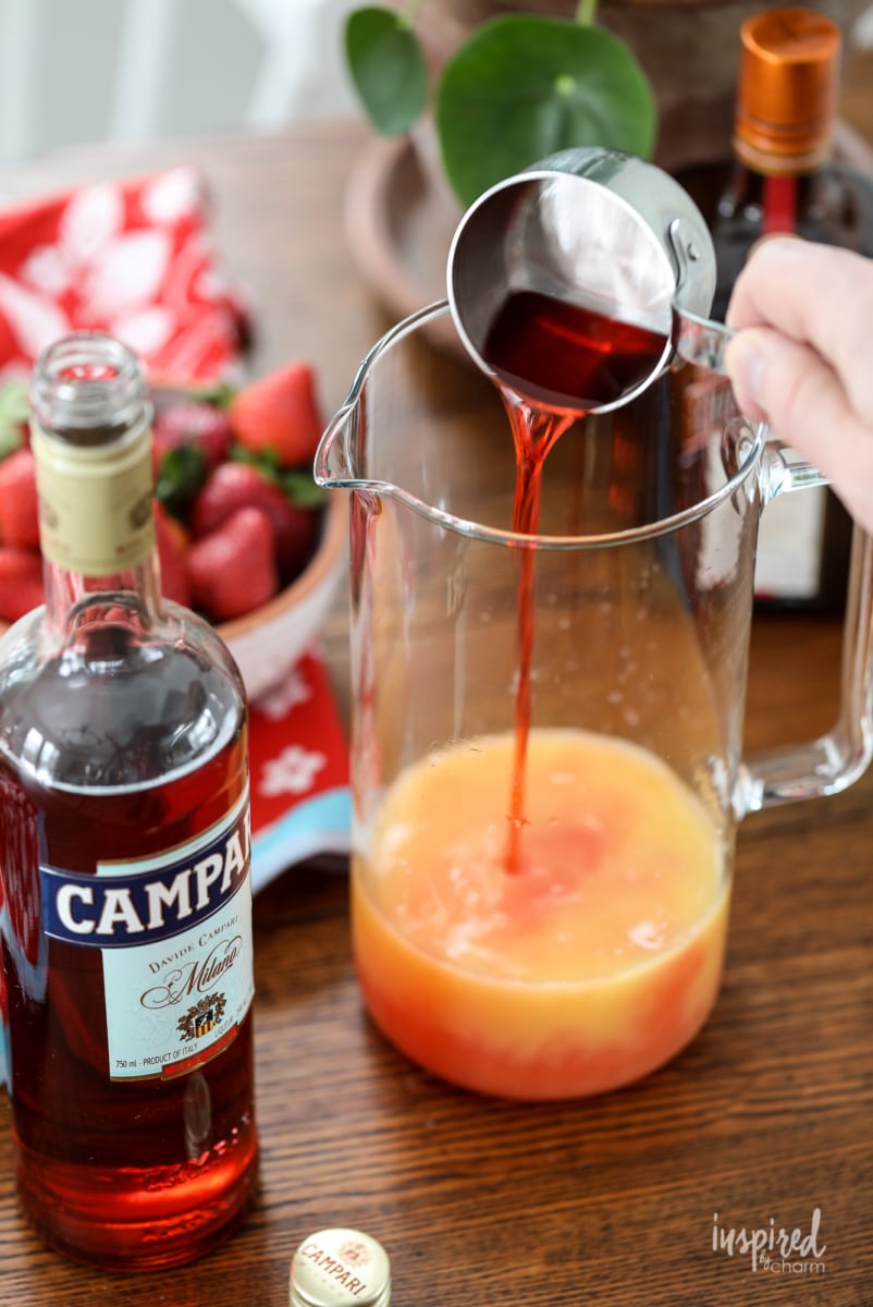 You're going to love this easy and delicious Campari Sangria Recipe! #sangria #recipe #summer #campari #rosé #wine #cocktail 